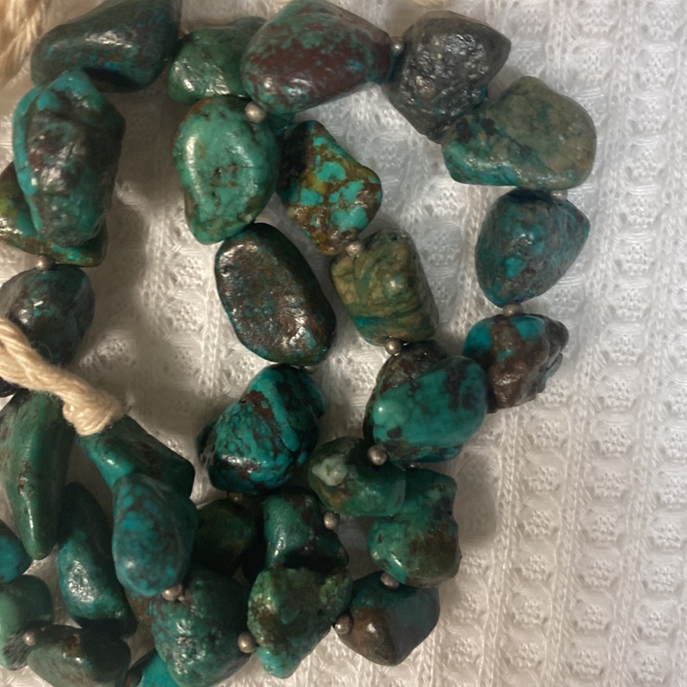 Southwestern style turquoise nugget necklace on cotton rope.